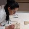 Conservator Samir Serhatlić retouching the Letter of the Moroccan King to the Dubrovnik Republic from the State Archives in Dubrovnik, 2010, Croatian Conservation Institute Photo Archive