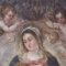 Detail of the figure of the Madonna crowned by angels, before the treatment