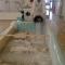 Zadar, Narodni muzej, kamena plastika s prikazom kraljice Elizabete i sv. Šimuna, priprema bazena s otopinom barij-hidroksida (snimka: Helena Ugrina, 2018.)